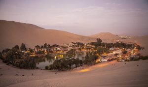 Sandboarding in Huacachina: View of the Oasis