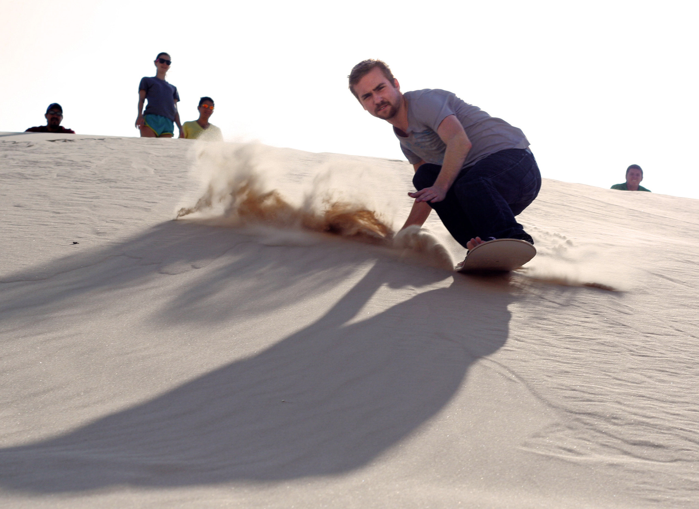 Surf sur les dunes de sable