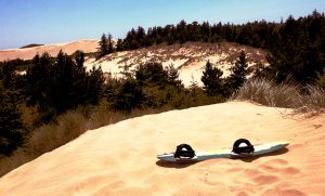 Sandboard on a dune near Florence OR