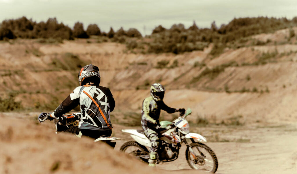 Dirt bikes racing in the desert