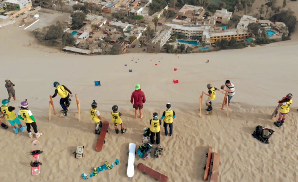 "Sueños de Arena" (Dreams of Sand) sandboarding social project in Huacachina. Ica, Peru.
