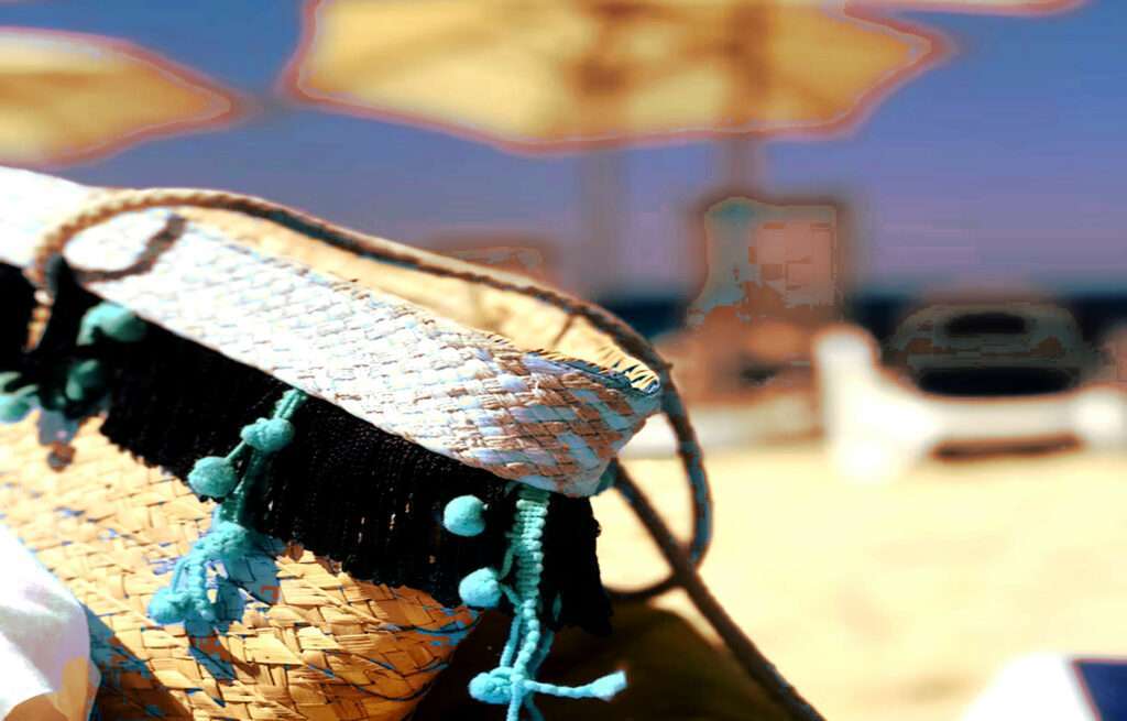 Mesh Beach Bag with Beach Umbrella in the Background