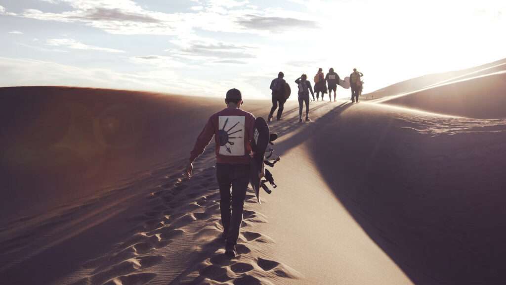 Sandboarding la Parcul și Rezervația Națională Great Sand Dunes, Colorado, STATELE UNITE ALE AMERICII