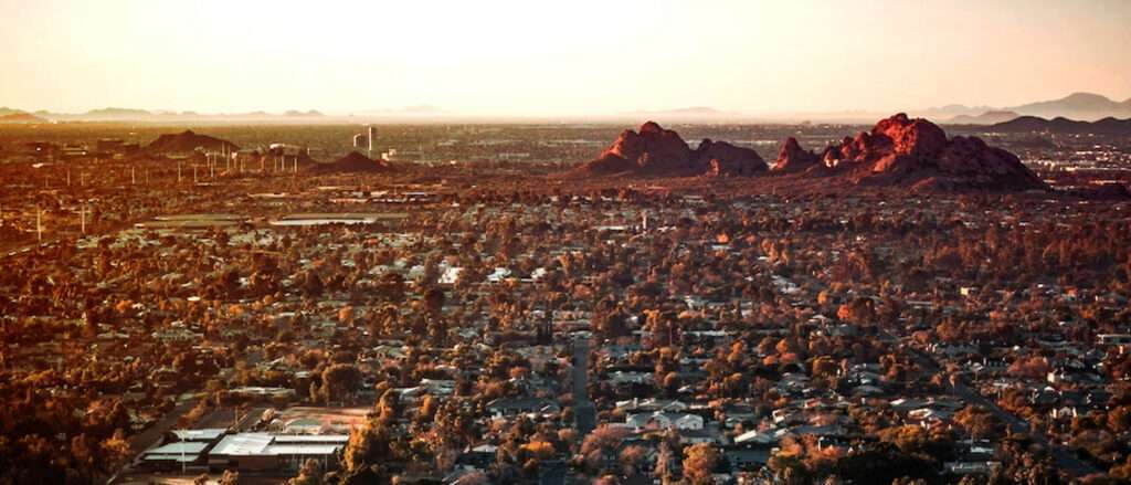 The Phoenix city skyline is seen shrouded in haze as temperatures soar to record highs.